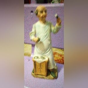 CERAMIC MAN FIGURINE